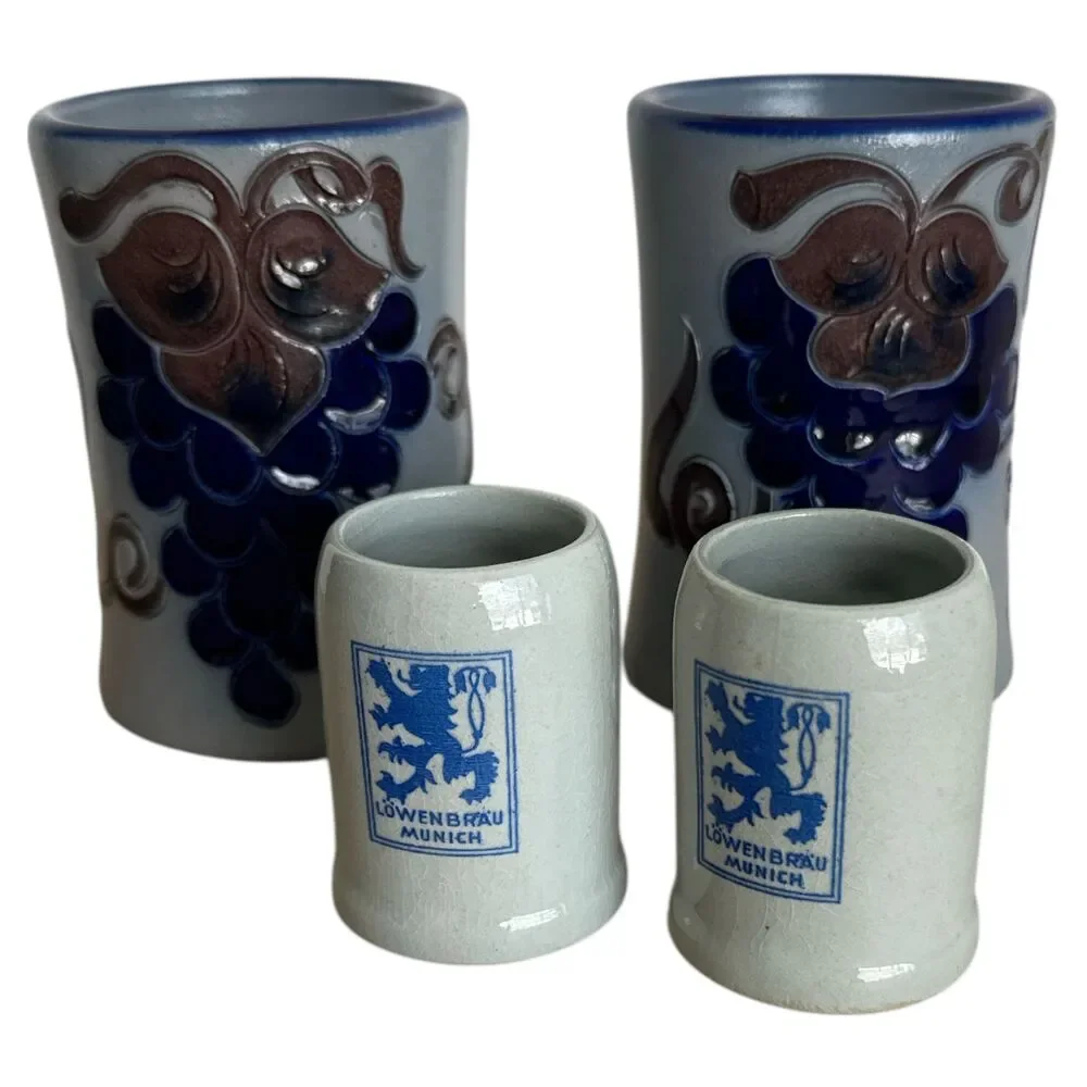 Lot of 4 Mini German Beer Stein Shot Glasses Löwenbräu & Grape Relief Design